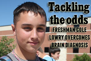 Freshman Cole Lowry is back to school after a benign brain tumor. 