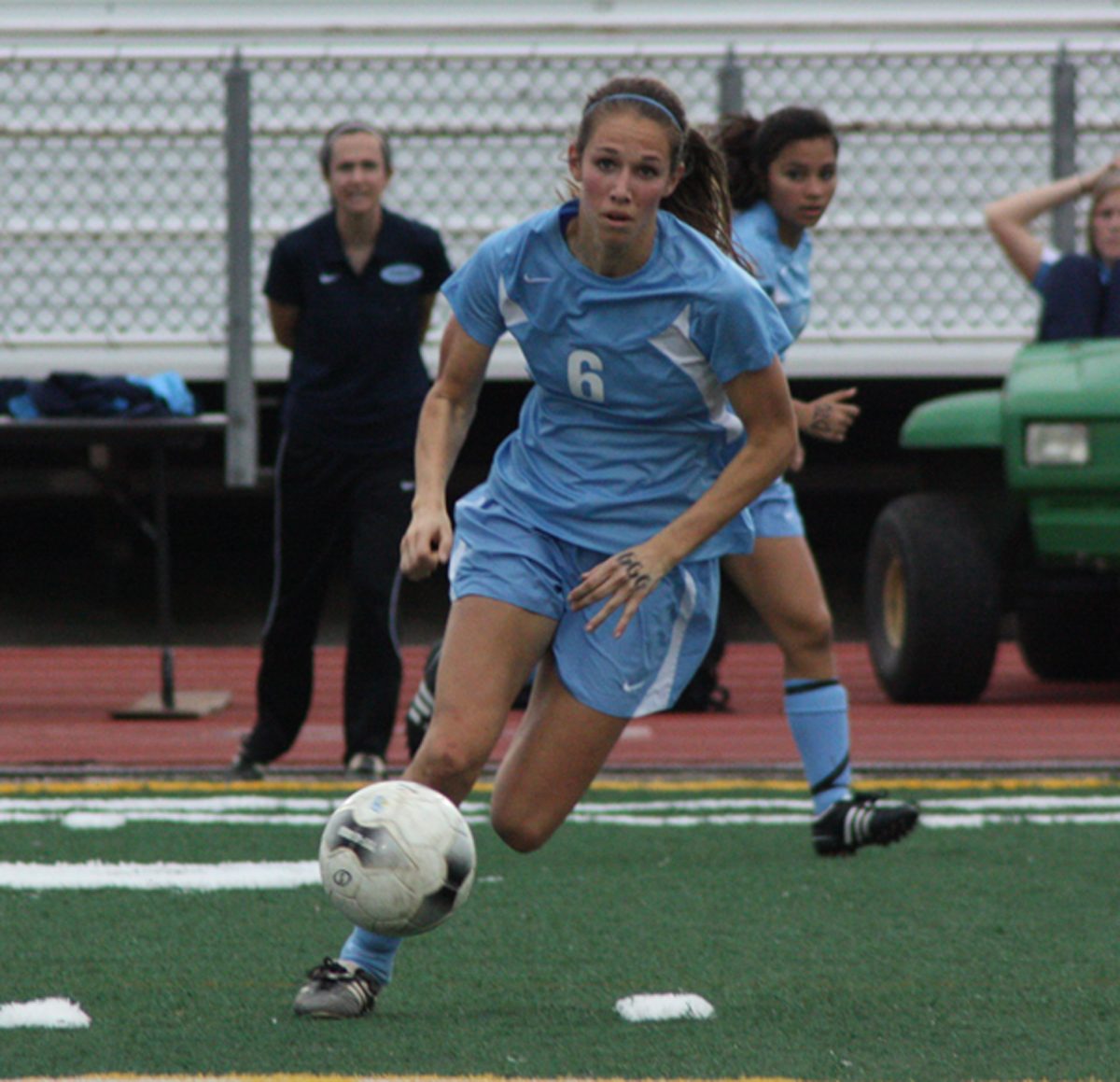 Junior Allie Gerner launches the ball across the field.