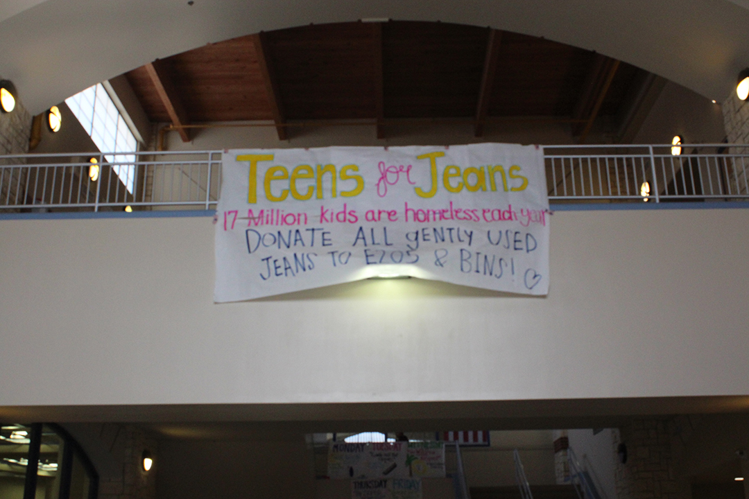 Johnson High school hangs posters across the campus to encourage students to donate their jeans to the fundraiser. 