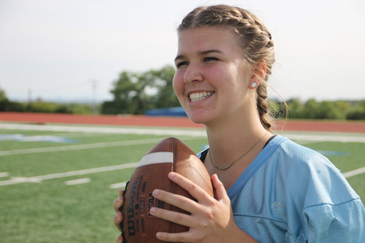 Junior Jessica Walker plays quarterback for junior team.