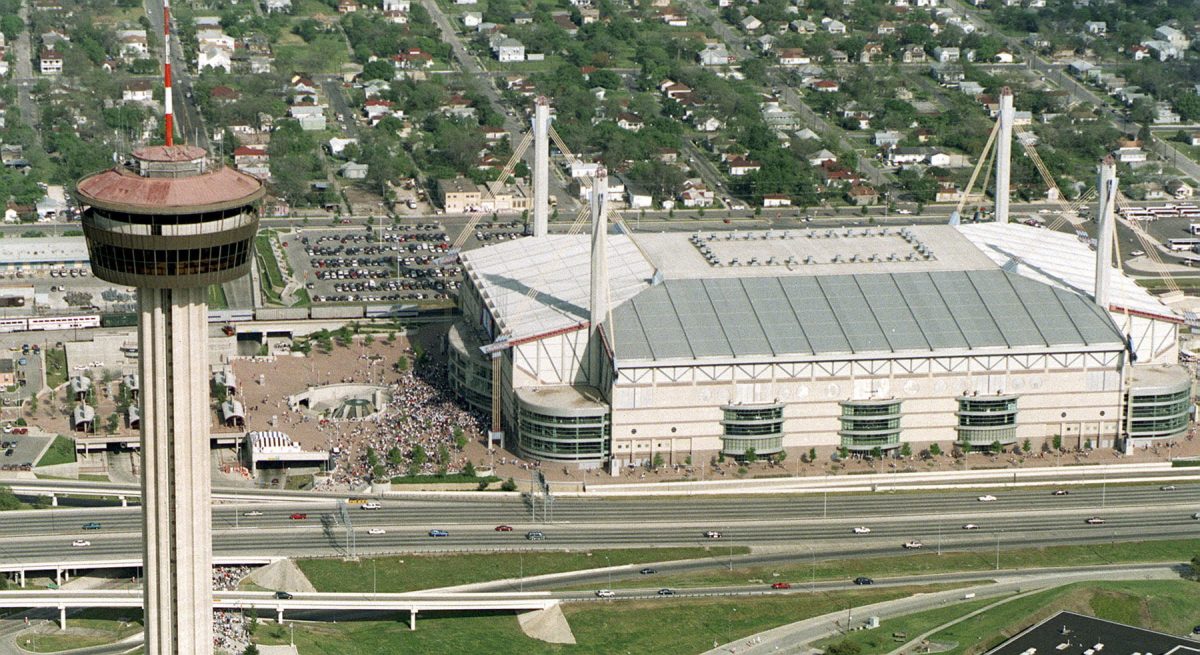 The+Alamodome+next+to+the+Tower+of+Americas
