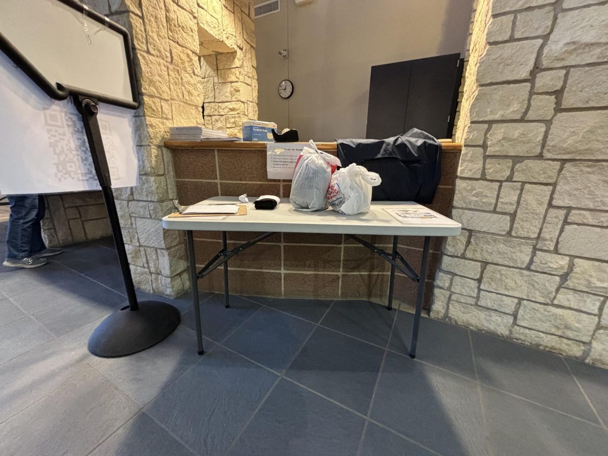 Food delivery table is located at the welcome center for parent and guardian food deliveries.