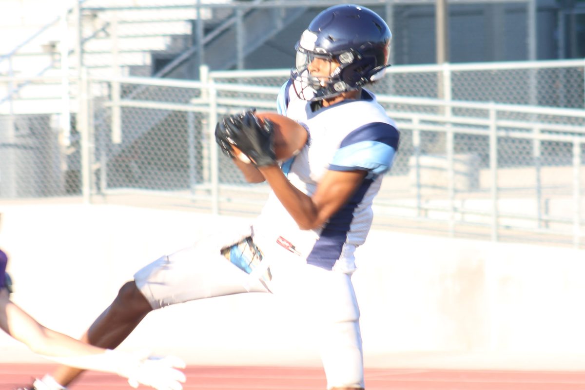 Nice Catch: 
Freshman Quinten Padilla catches a pass in the endzone against Pieper High School. Padilla is a wide receiver on Freshman A-Team football for Johnson High School. "I was really hyped because they just scored, and it was a great throw by James Hugkins," Padilla said. “It means alot. I've been playing for a while, and just decided to be on varsity next year,” Padilla said.
