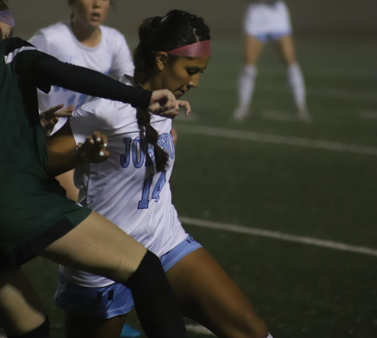 Senior captain Krista Perez steps a Regan forward to make a tackle in order to prevent a counter attack.