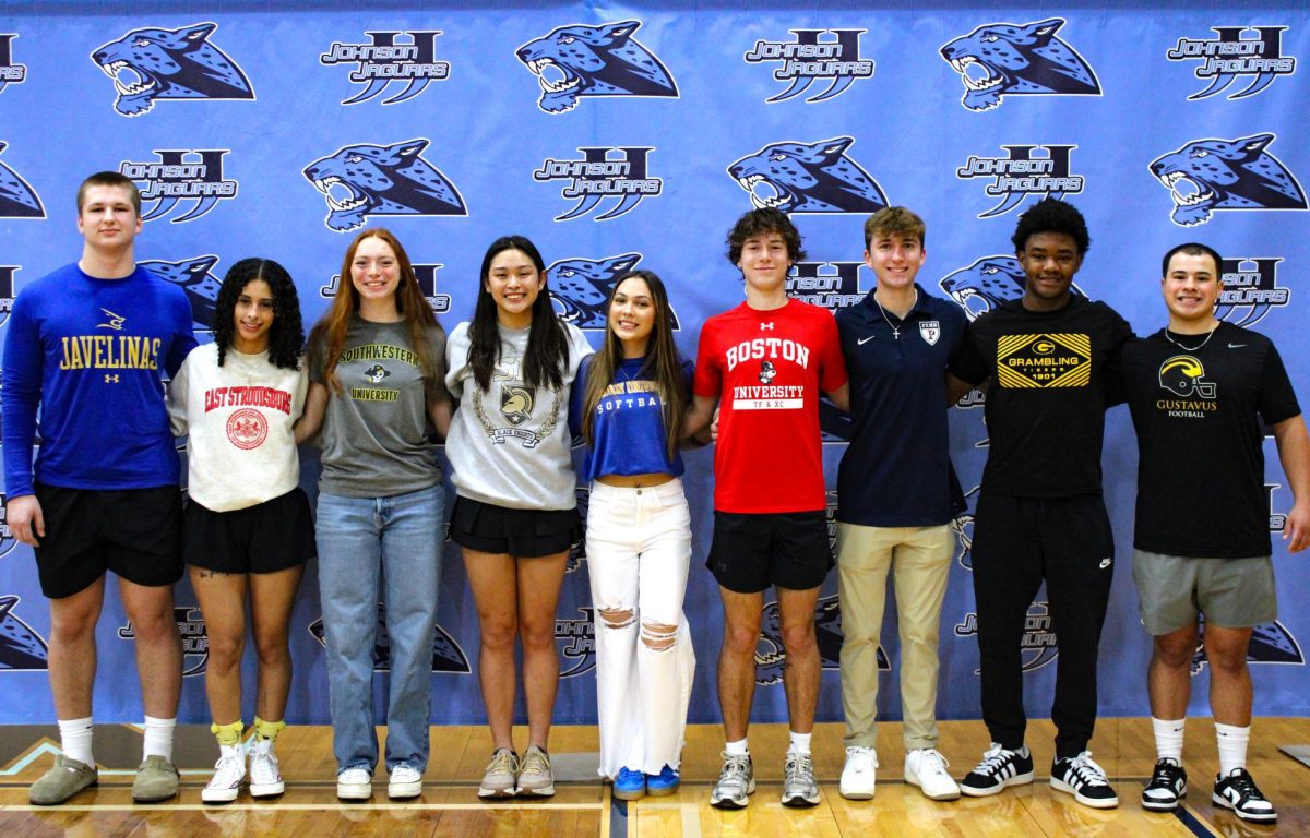 February signees pose together before signing with their institutions. Signing Day is a tradition for student athletes taking the next step towards their collegiate career.